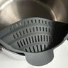 Clip-on pasta strainer
