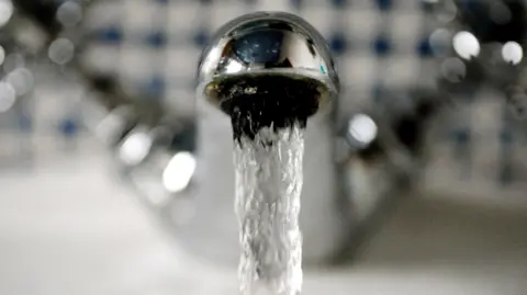 PA Water runs out of a silver tap
