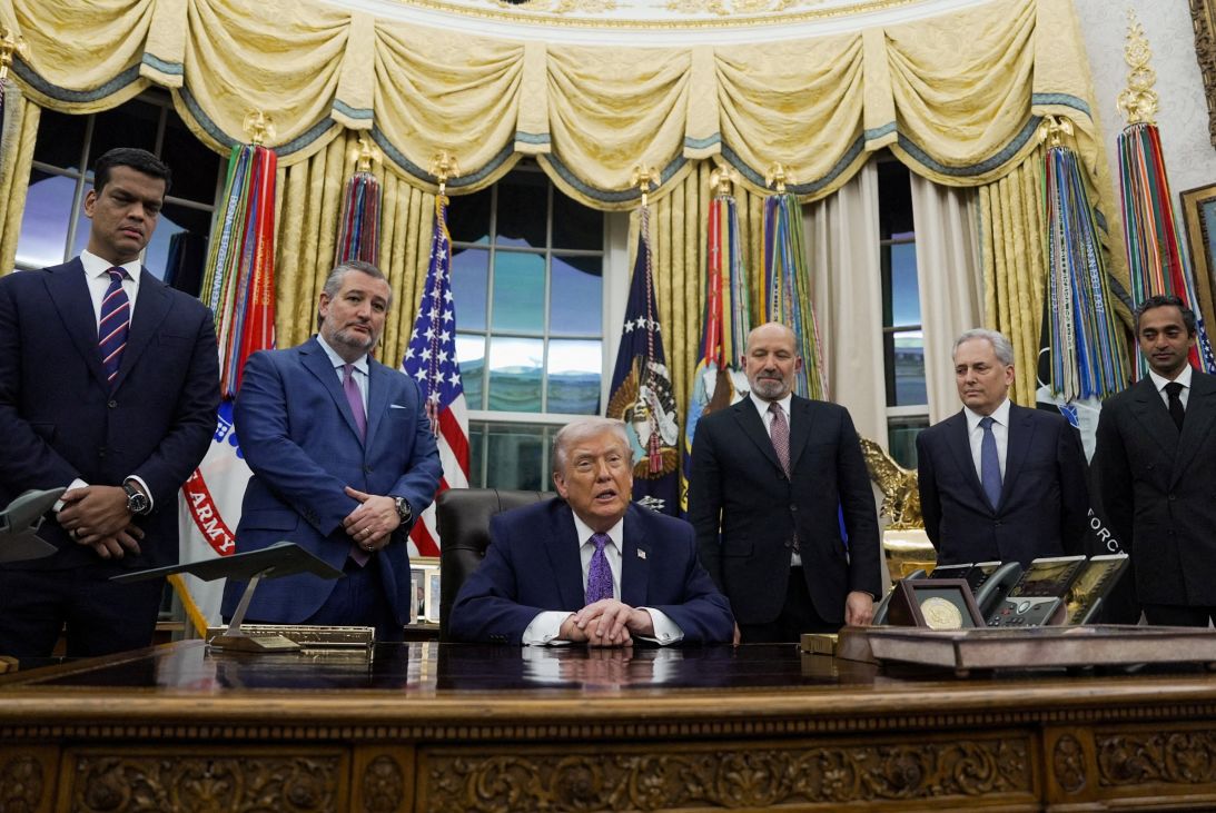 President Donald Trump looks on, as he signs an executive order on AI in the Oval Office at the White House in Washington, D.C., U.S. December 11, 2025.